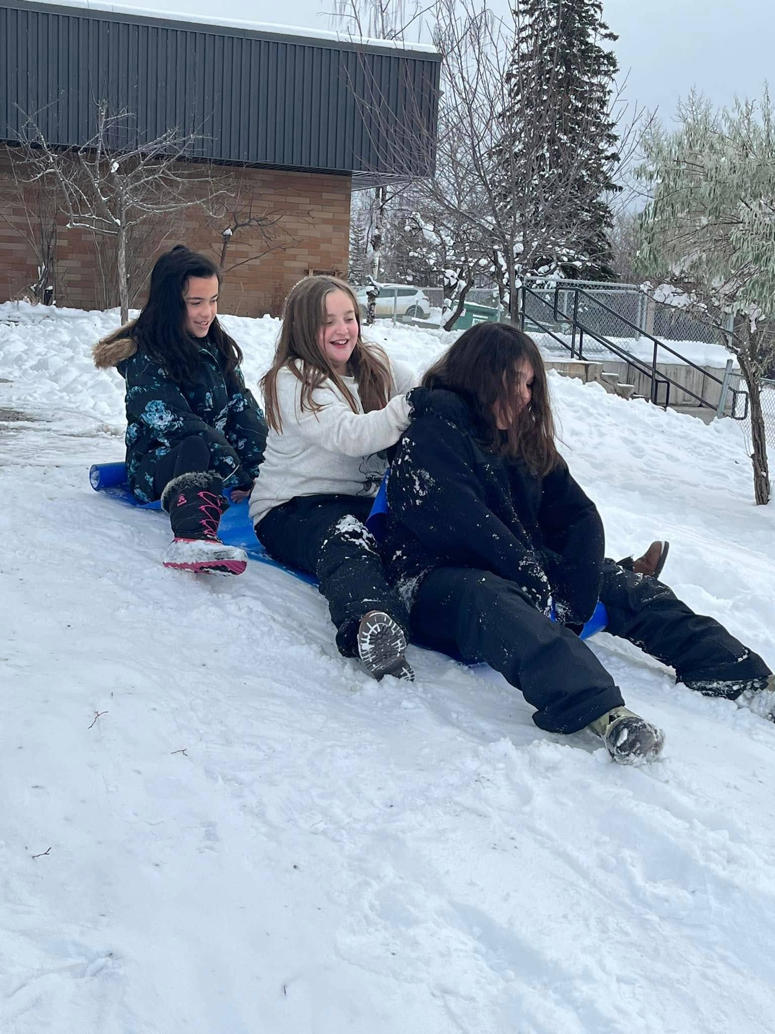 Girls sliding